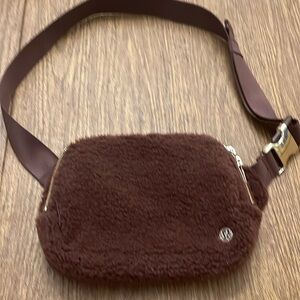 Adorable Lululemon Fleece Everywhere Belt Bag brown and gold. Never used.